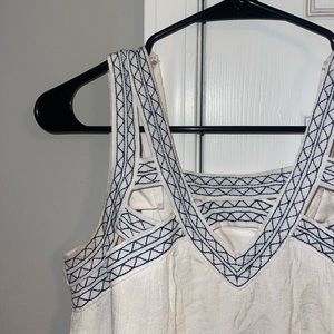 White linen dress with blue stitching